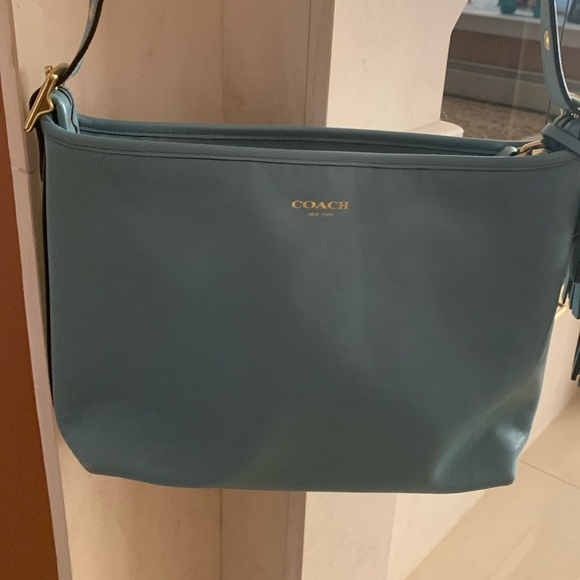 Coach teal leather adjustable crossbody bag. Gently used.